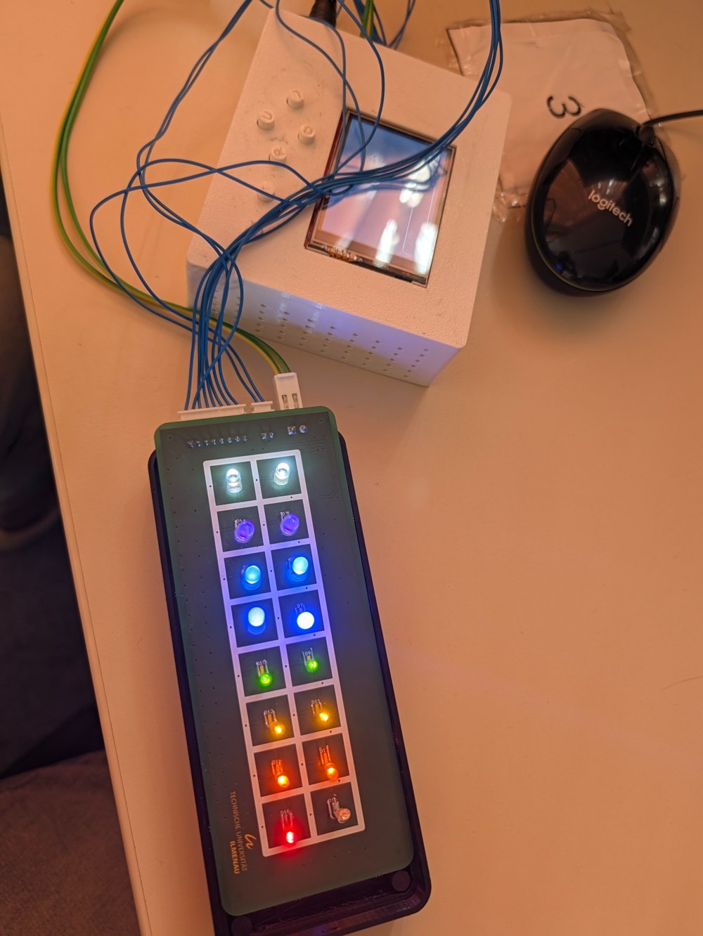 User-supplied photograph of the illuminated sixteen-position LED unit next to the controller